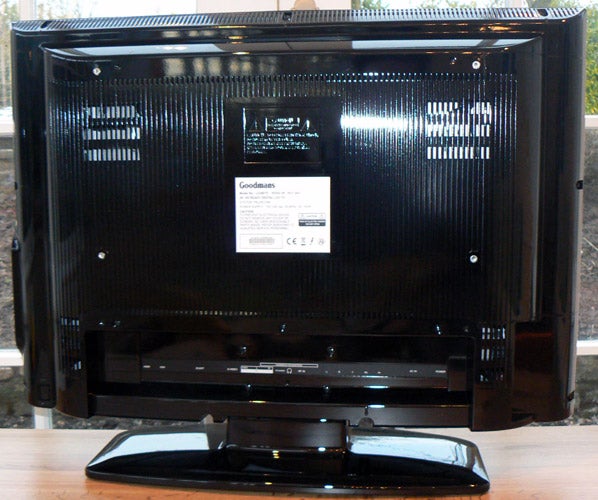 Rear view of Goodmans LD2667D 26-inch LCD TV on stand.