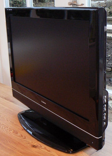 Goodmans LD2667D 26in LCD TV on wooden surface.