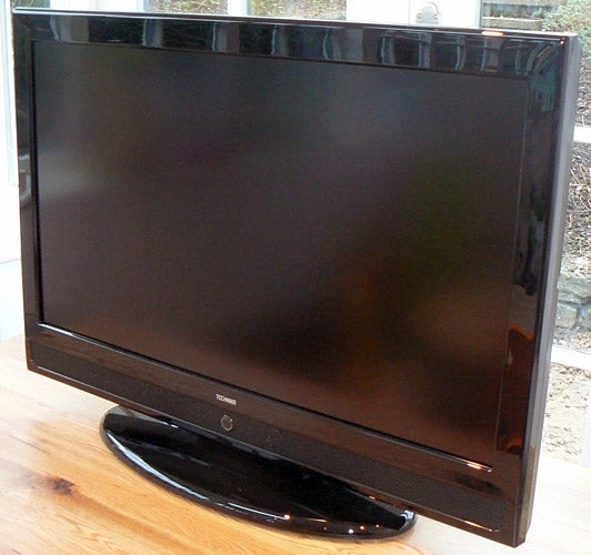 Tesco Technika LCD32-209 32-inch LCD television on a stand.