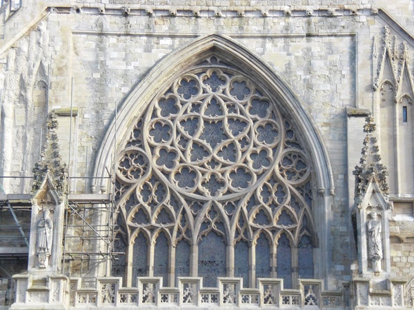 Close-up of an ornate gothic church window.