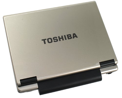 Toshiba NB100-128 netbook closed lid view on white background.
