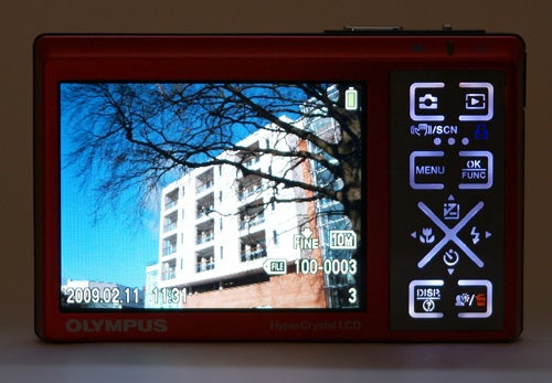 Olympus mju 1040 camera displaying a photo and menu options.