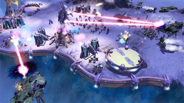 Halo Wars gameplay showing a battle scene with futuristic units.