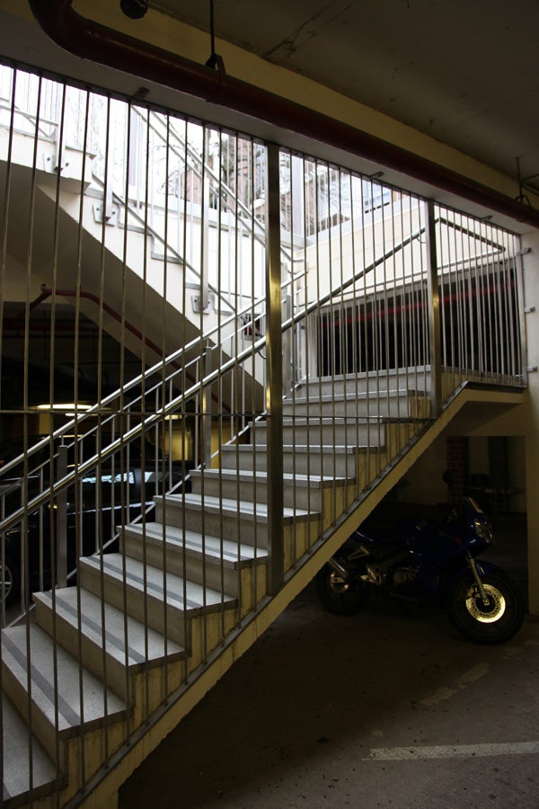 Photo of motorcycle under staircase taken with Canon EOS 5D MkII.