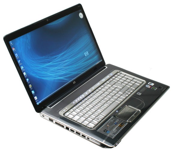 HP HDX18-1005ea 18.4-inch notebook with screen on and keyboard visible.