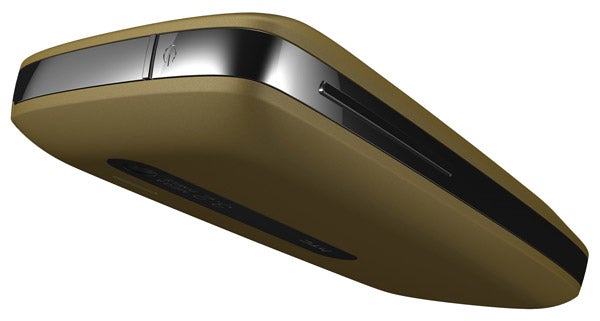 HTC Touch 3G smartphone in gold color viewed from side angle.