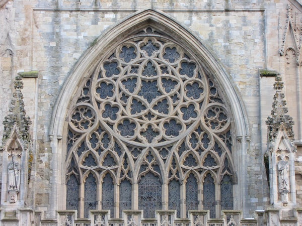 Detailed photo of a Gothic church window architecture.