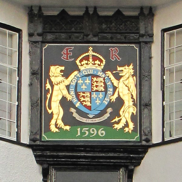 Ornate coat of arms plaque with date 1596.