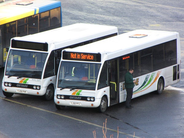 Two buses parked with 