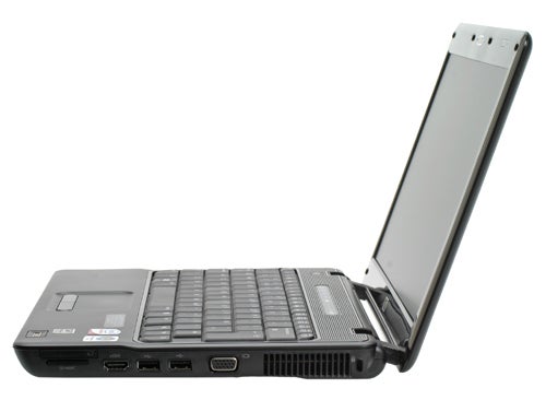 HP Compaq 2230s laptop with open lid on white background.