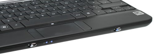 Close-up of HP Compaq Mini 700 netbook keyboard and trackpad.