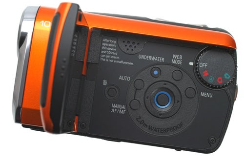 Panasonic SDR-SW21 camcorder with buttons and dials visible.