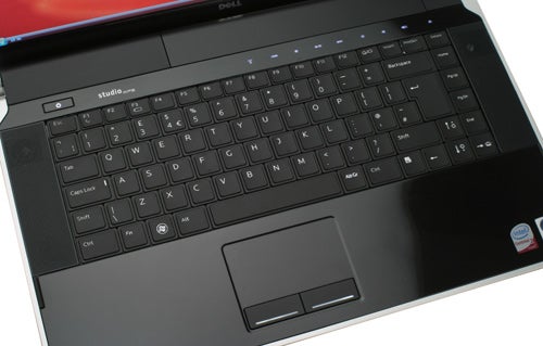 Dell Studio XPS 16 laptop keyboard and touchpad close-up.