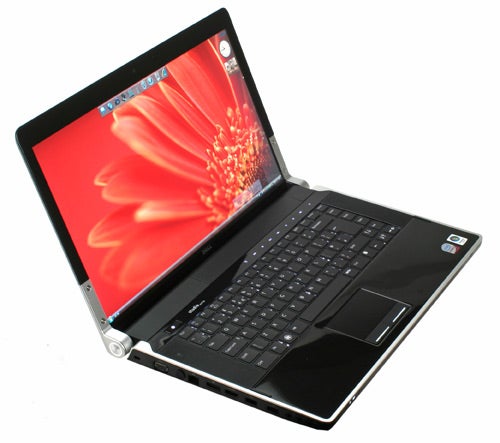 Dell Studio XPS 16 laptop with vibrant RGB LED display open.
