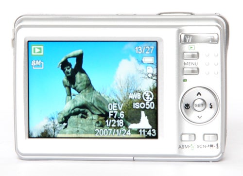 Genius G-Shot P831 digital camera displaying photo on screen.