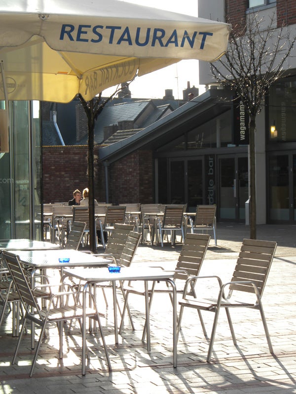 Outdoor cafe seating area, sunny day, taken with Nikon CoolPix S630.