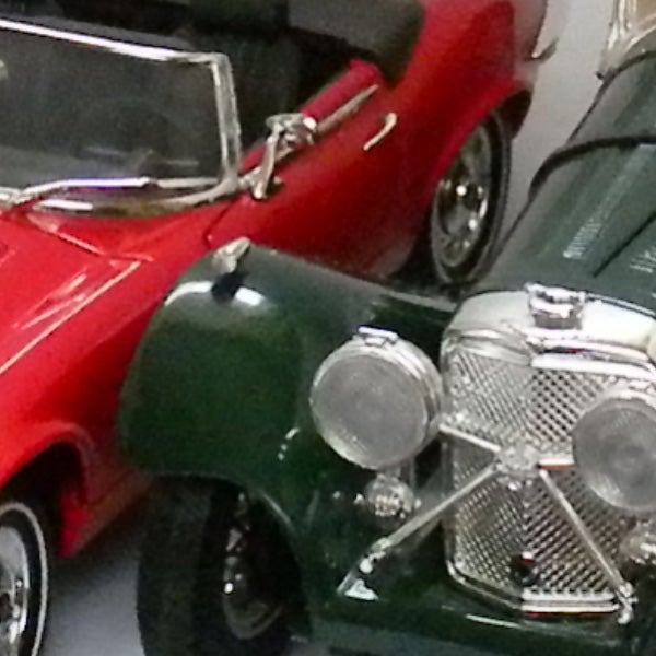 Close-up of colorful toy cars on display