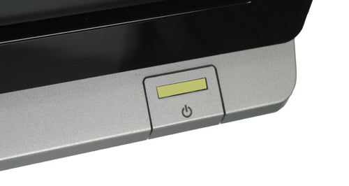 Close-up of BenQ E2200HD monitor power button.