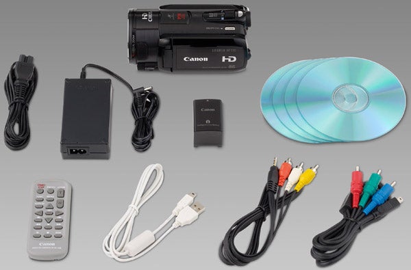 Canon Legria HF S10 camcorder with accessories and cables.