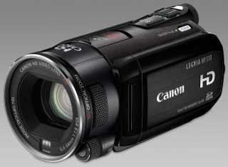 Canon Legria HF S10 camcorder on a gray background.