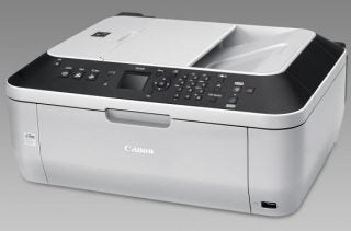 Canon PIXMA MX330 Inkjet Printer on a gray background.