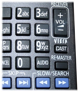 Close-up of Panasonic Blu-ray player remote control buttons.
