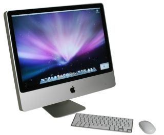 Apple iMac 24-inch 2009 edition with keyboard and mouse.