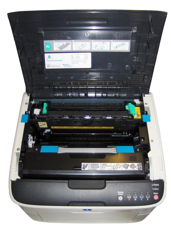 Open Konica Minolta Magicolor 1600 W laser printer showing toner cartridges.