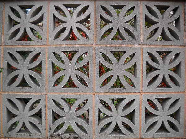 Decorative concrete block wall with symmetrical patterns