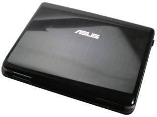Asus N50Vc 15.4-inch notebook with closed lid showing logo.