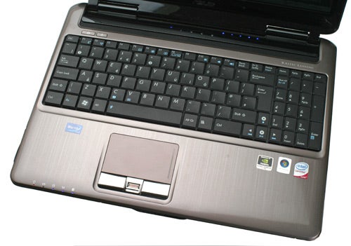 Asus N50Vc notebook open showing keyboard and touchpad.