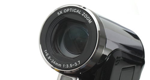 Close-up of Toshiba Camileo P30 camcorder lens with specifications