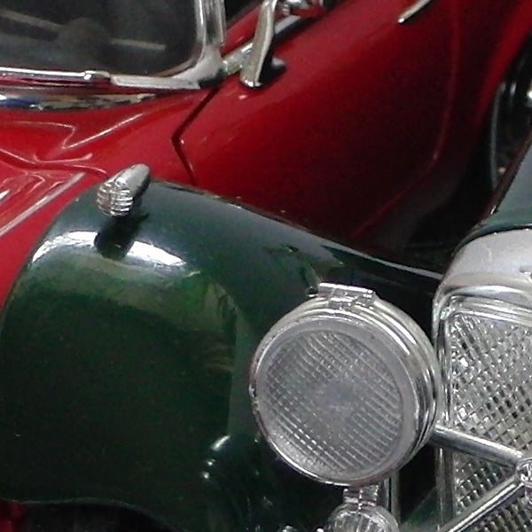 Close-up of a vintage toy car model.