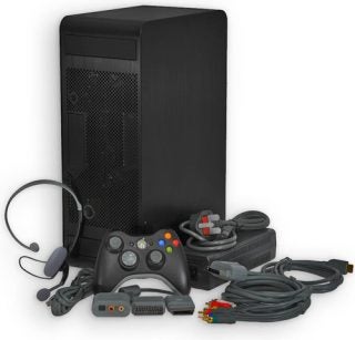 Quiet PC Xbox 360 console with controller and accessories
