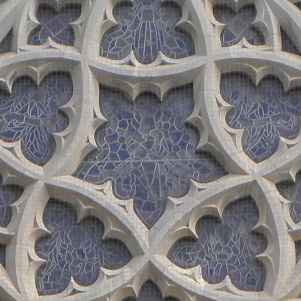 Close-up of intricate stone lattice work patterns.