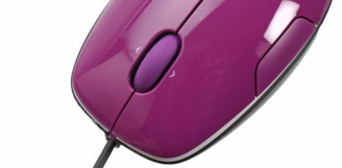 Close-up of a purple Logitech LS1 Laser Mouse.