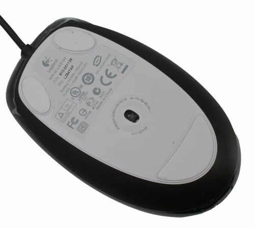 Bottom view of a Logitech LS1 Laser Mouse showing labels and sensor.