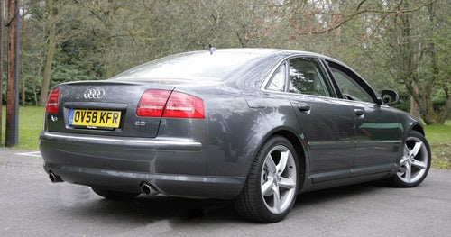 Rear angle view of a gray Audi A8 2.8 Sport Multitronic.