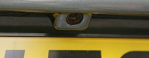 Close-up of Audi A8 rear camera and license plate.
