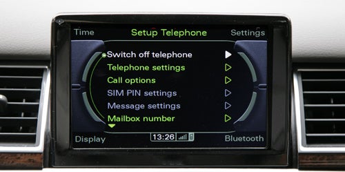 Audi A8 infotainment system displaying telephone settings menu.