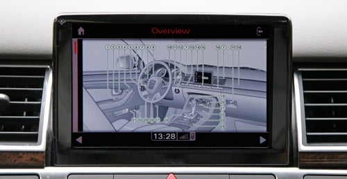 In-vehicle display showing Audi A8 parking assist system.