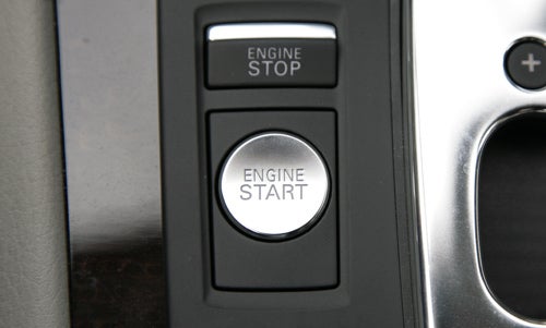 Audi A8 engine start and stop button detail.