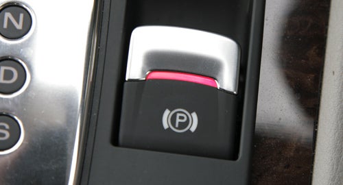 Audi A8 electronic parking brake button and gear selector.