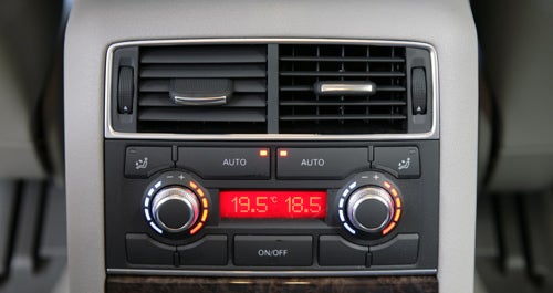 Audi A8 climate control interface showing temperature settings.
