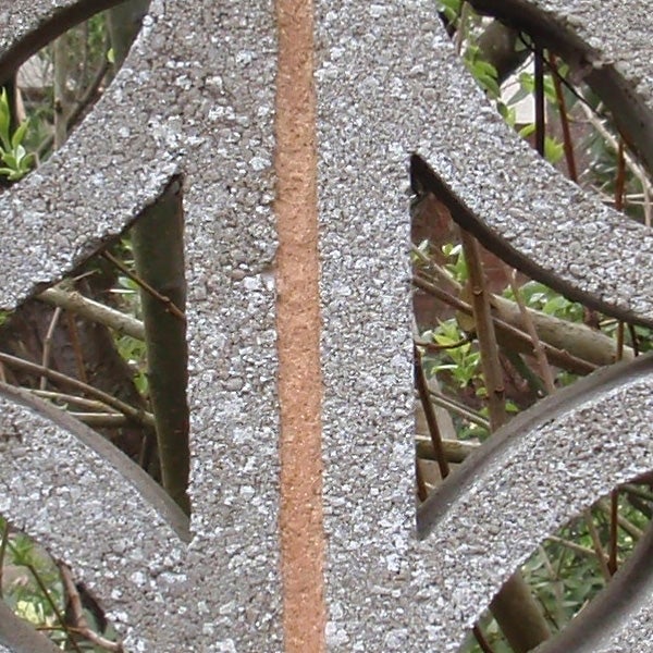 Close-up of a metallic pattern with rust line.
