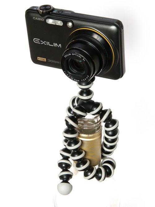 Compact camera mounted on Joby Gorillapod flexible tripod.