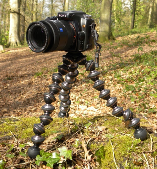 Sony camera mounted on flexible Joby Gorillapod tripod outdoors.