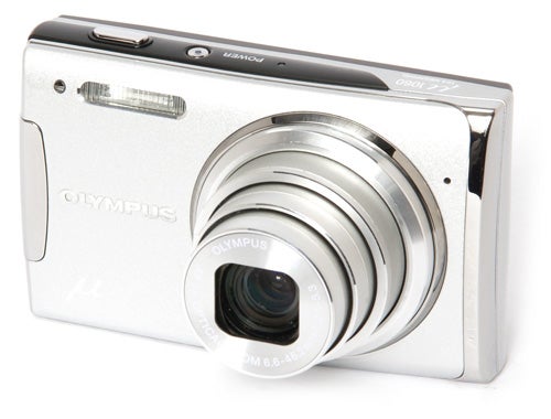 Olympus mju 1060 camera on a white background.