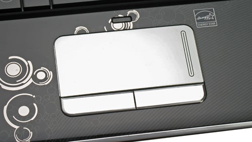 HP Pavilion dv2 notebook touchpad and patterned palm rest design.