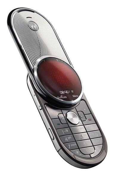 Motorola Aura luxury mobile phone with circular display open.